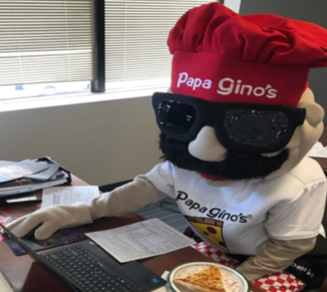 Papa Gino's mascot doing taxes